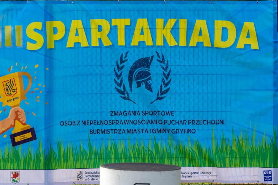 2.Niebieski baner z napisem III Spartakiada